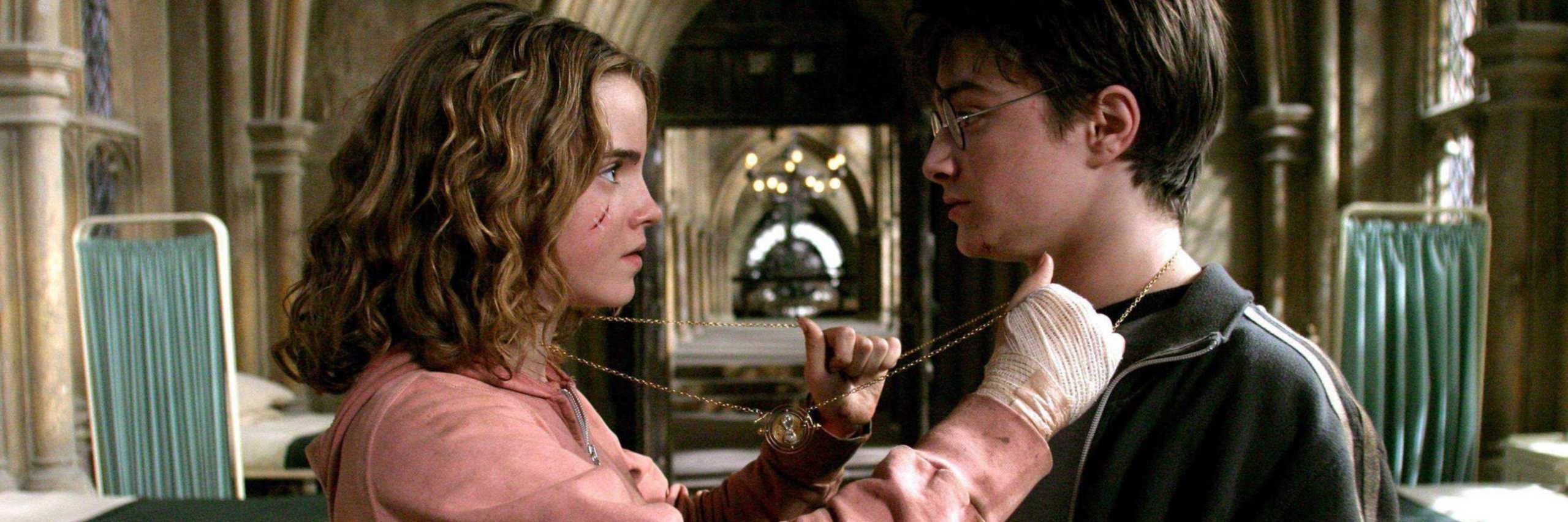 Hermione and Harry using the Time Turner in the Hospital Wing.